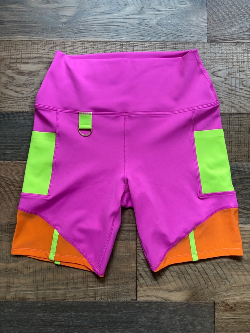 Peloton x Brittany Allen Pink Athletic Shorts with Neon Green & Orange Panels
